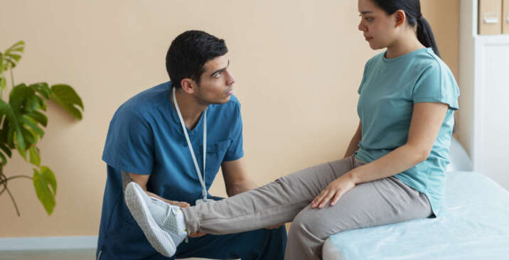 doctor-helping-patient-rehabilitation doctor-helping-patient-rehabilitation